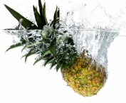 Fresh Pineapple Landing in Water